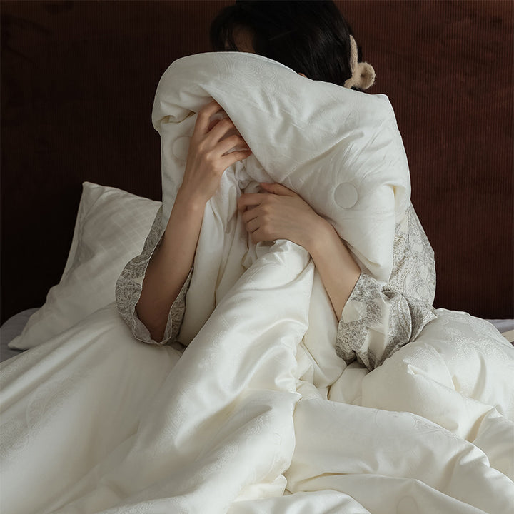 All-season quilt made of cotton microfiber with climate zones and soft touch