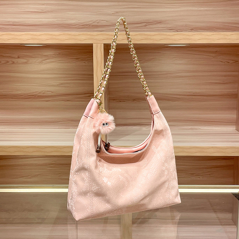 Chic Shoulder Bag with Decorative Charm