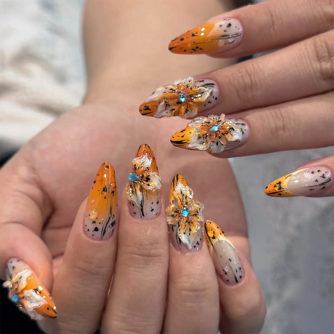 Artificial nail set with elegant floral design and sophisticated glitter elements Kalsten