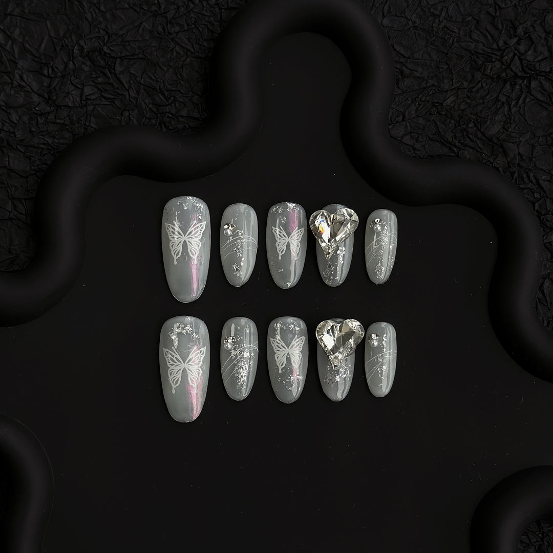 Artistic Press-On Nail Art Set with Butterfly Design and Gem Accents