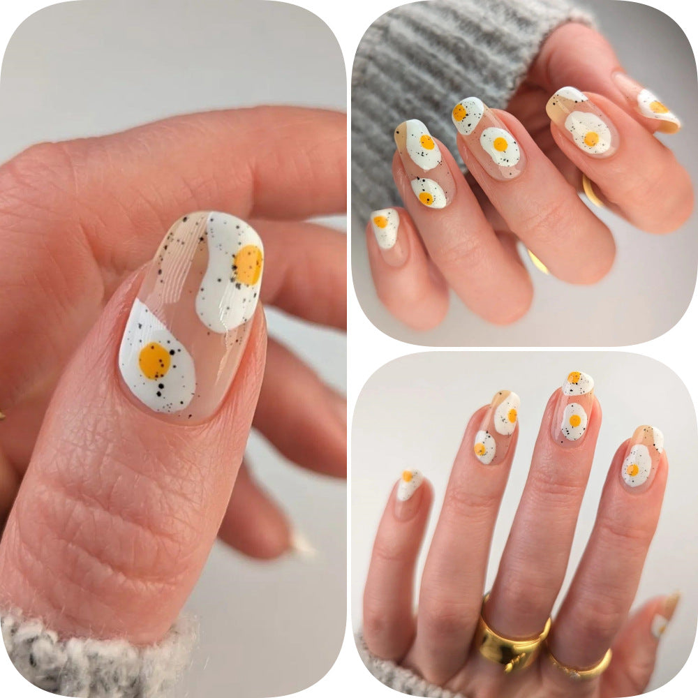 Artificial nails in creative fried egg design Kalsten