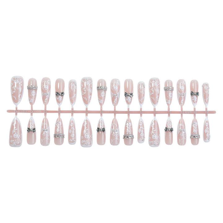 Artificial nail set with romantic floral design and sparkling accents Kalsten