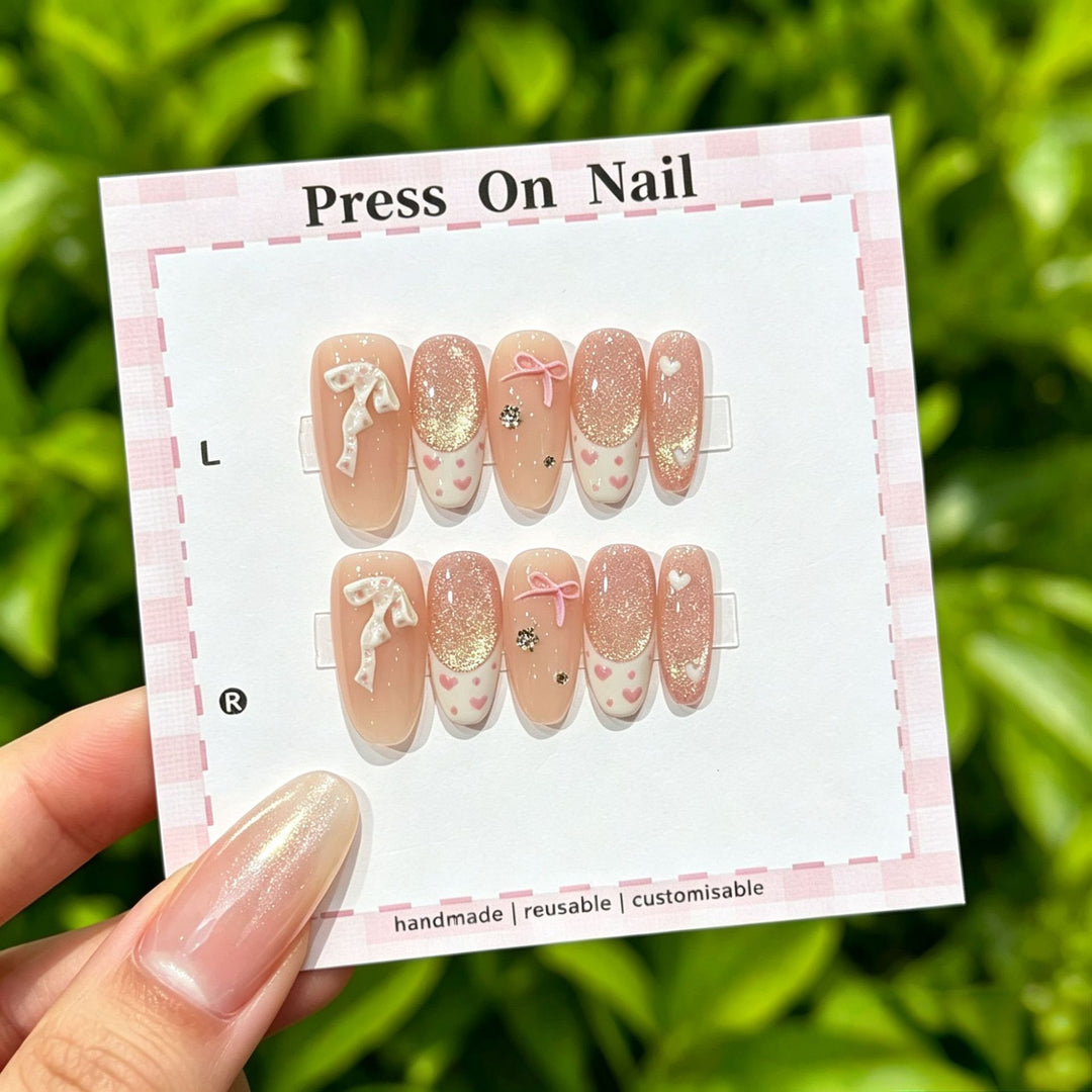 Artistic Press-On Nail Art Set with Cute Character and Bow Accents