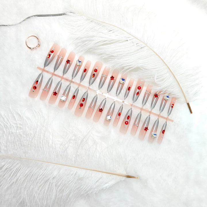 Artificial nails with glamorous glitter design and 3D applications Kalsten