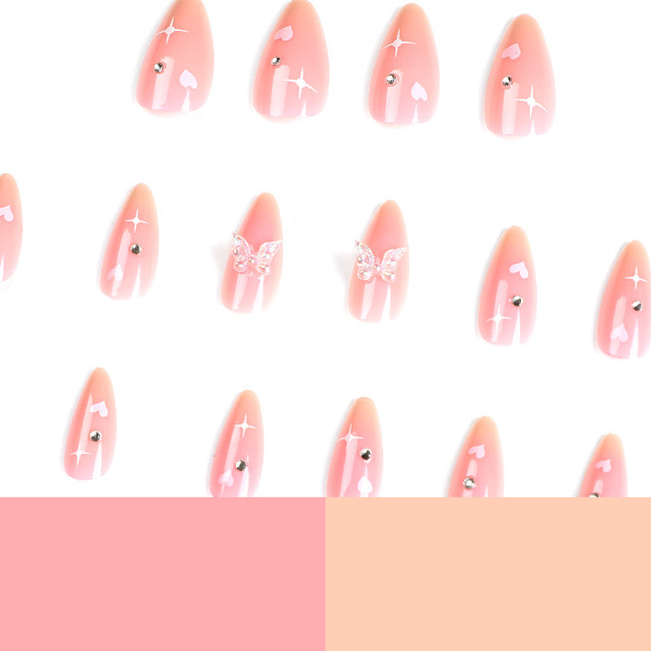 Artful nail art with heart motifs and glitter accents Kalsten