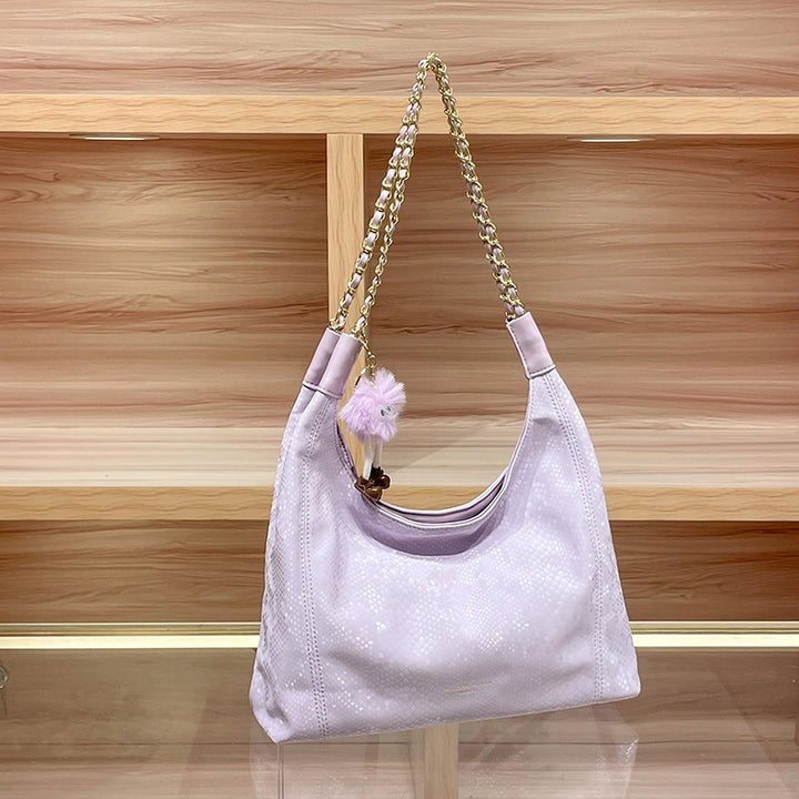 Chic Shoulder Bag with Decorative Charm