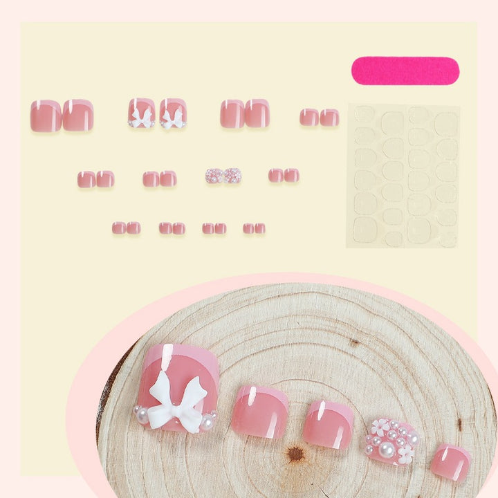 Artificial nail set with romantic bow design Kalsten