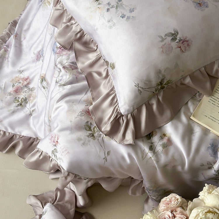 Satin sleep set with silky finish, watercolor flower motif and ruffle edges