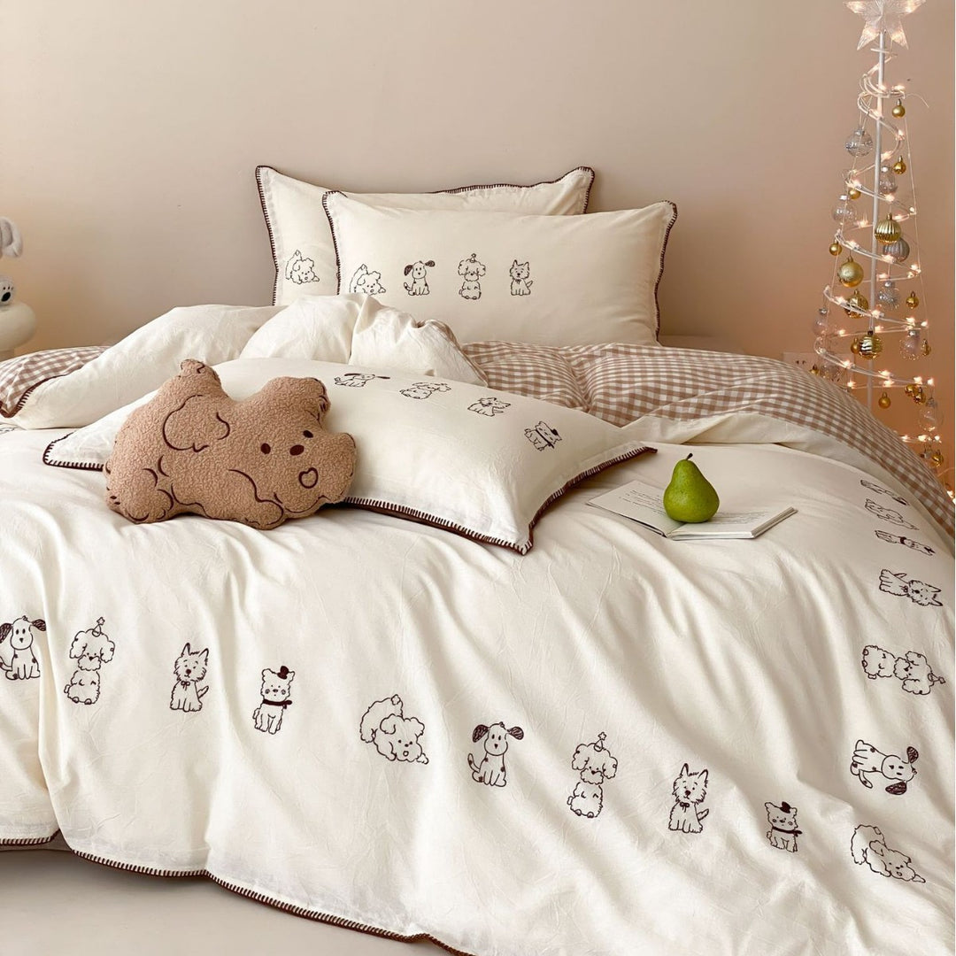 Bedding set made of cotton percale with fine embroidery and cute dog motifs