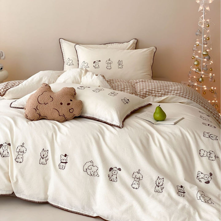 Bedding set made of cotton percale with fine embroidery and cute dog motifs