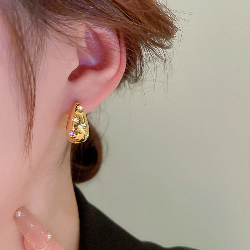 Fashionable earrings with floral design Kalsten