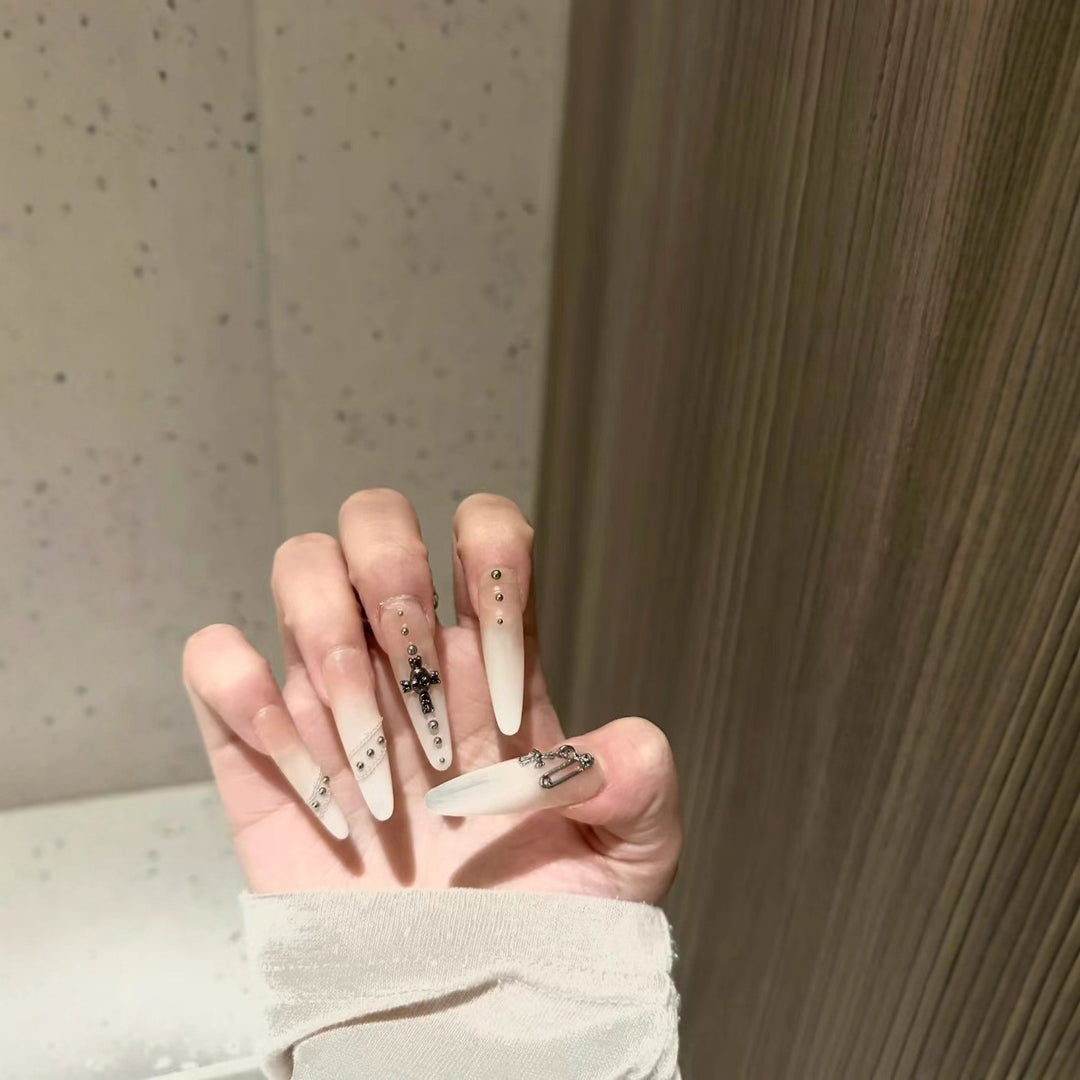 Artistic Stiletto Nail Art Extensions with Decorative Accents