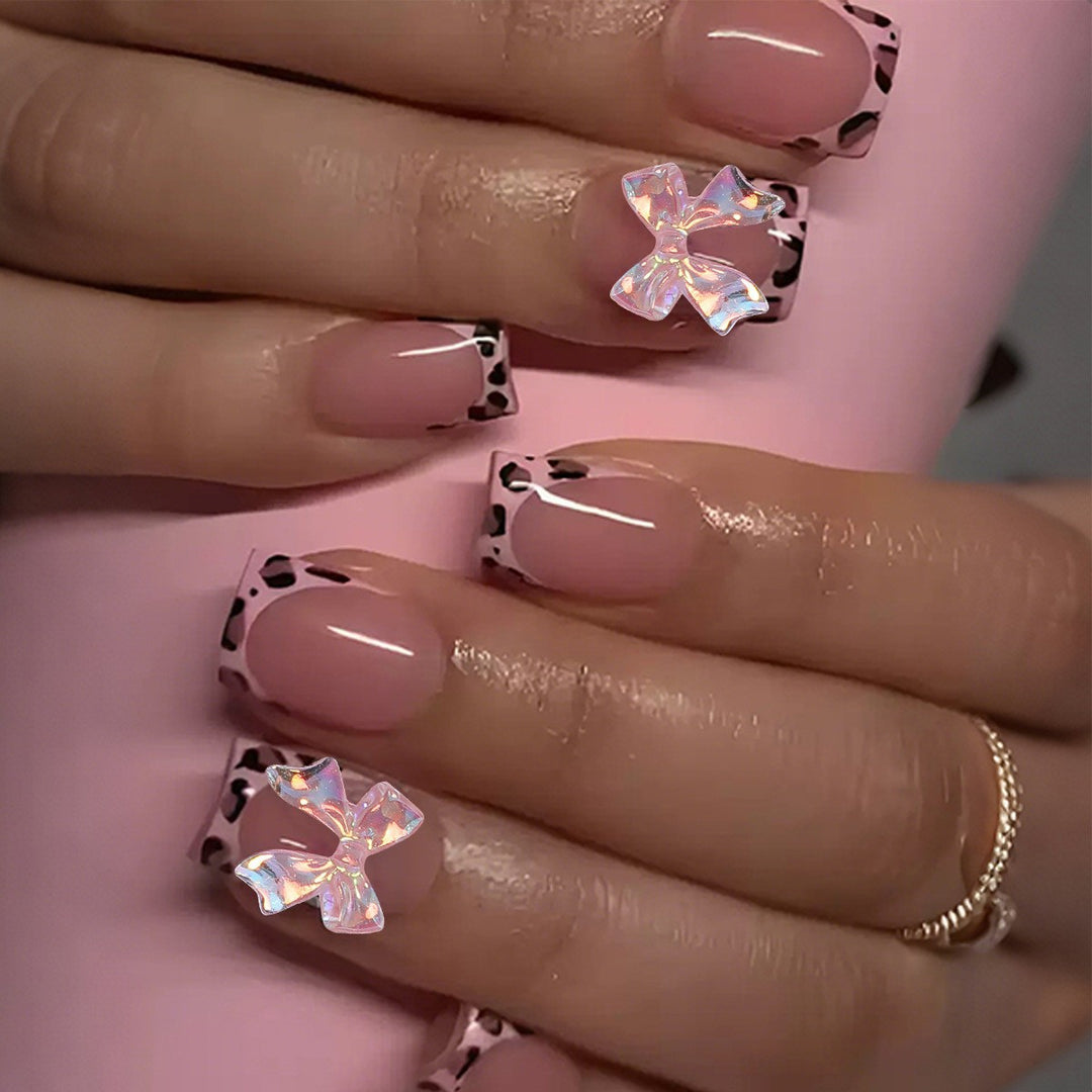 Artificial nail set with glamorous leopard pattern and elegant bows Kalsten