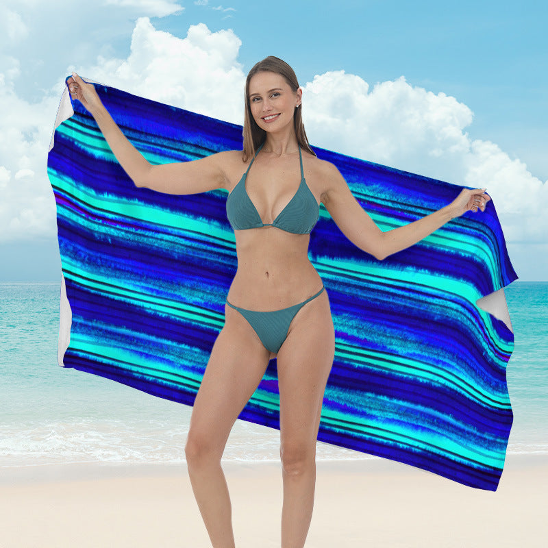 Beach towel with vibrant tropical plant motif Kalsten