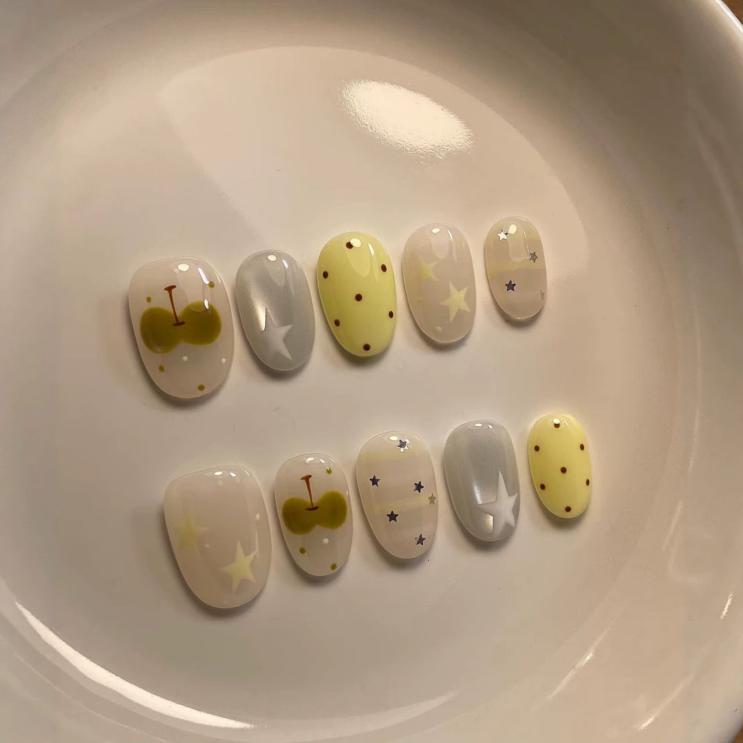 Artistic Press-On Nail Set with Whimsical Patterns