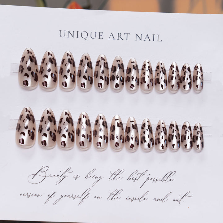 Artistic Stiletto Press-On Nail Design with Leopard Print