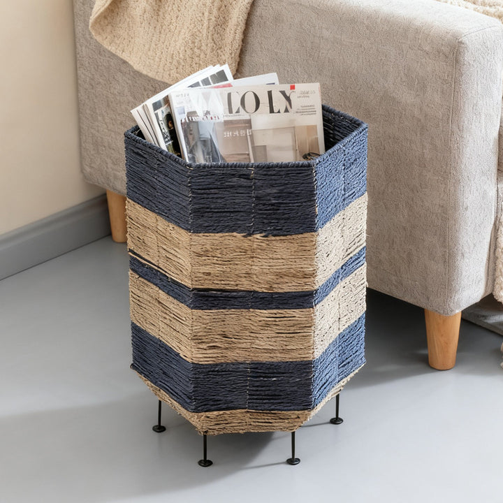 Stylish laundry basket made of rattan with metal legs Kalsten