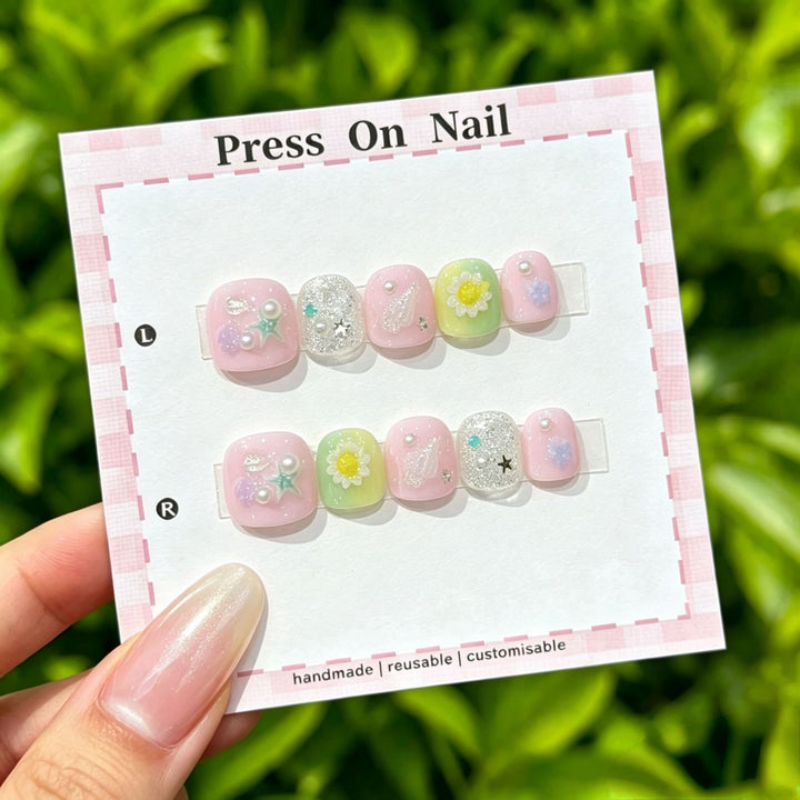 Artistic Press-On Nail Set with Floral and Graphic Designs