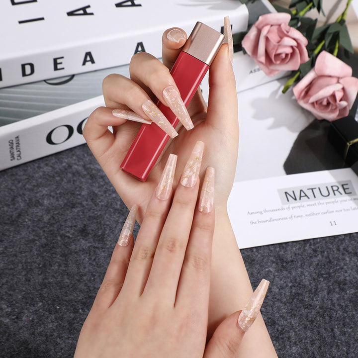 Artificial nails in elegant geometric design Kalsten