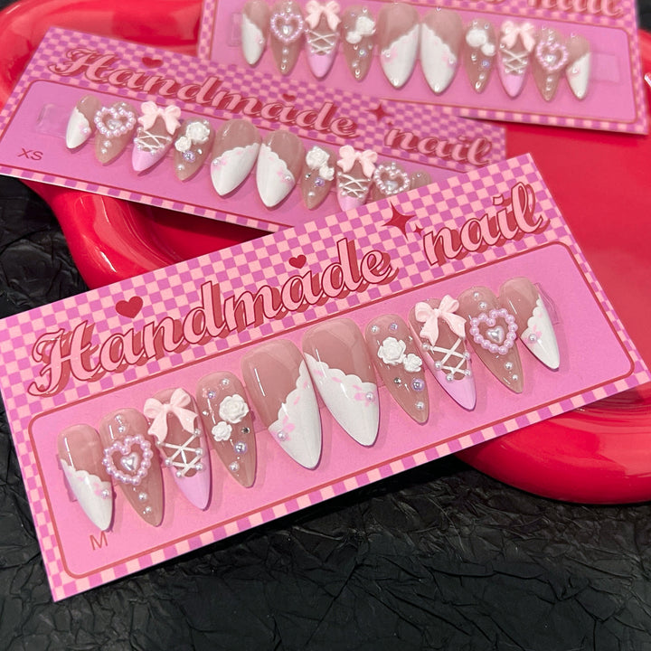 Artful stiletto nails with romantic accents Kalsten