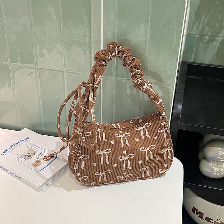Playful Bow-Print Shoulder Bag