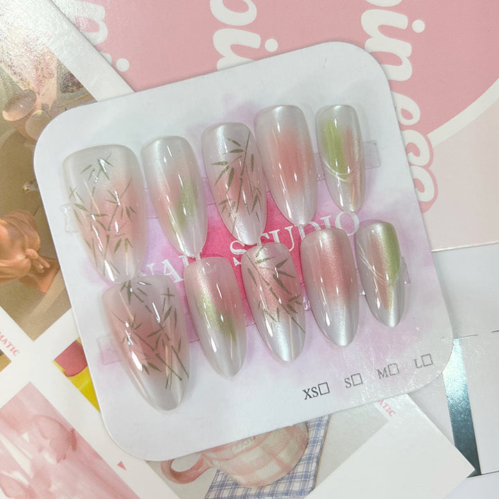 Artificial nail tips with elegant design and botanical accents Kalsten