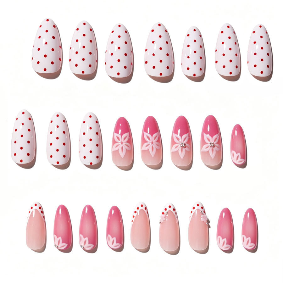 Artificial nail set with floral accents and charming polka dots Kalsten