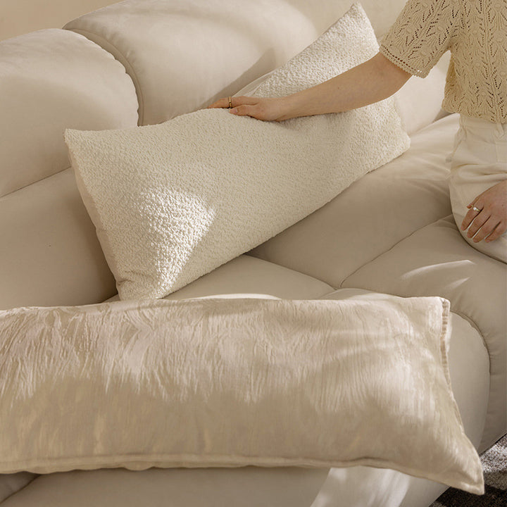 Extra-long ergonomic bouclé lumbar pillow