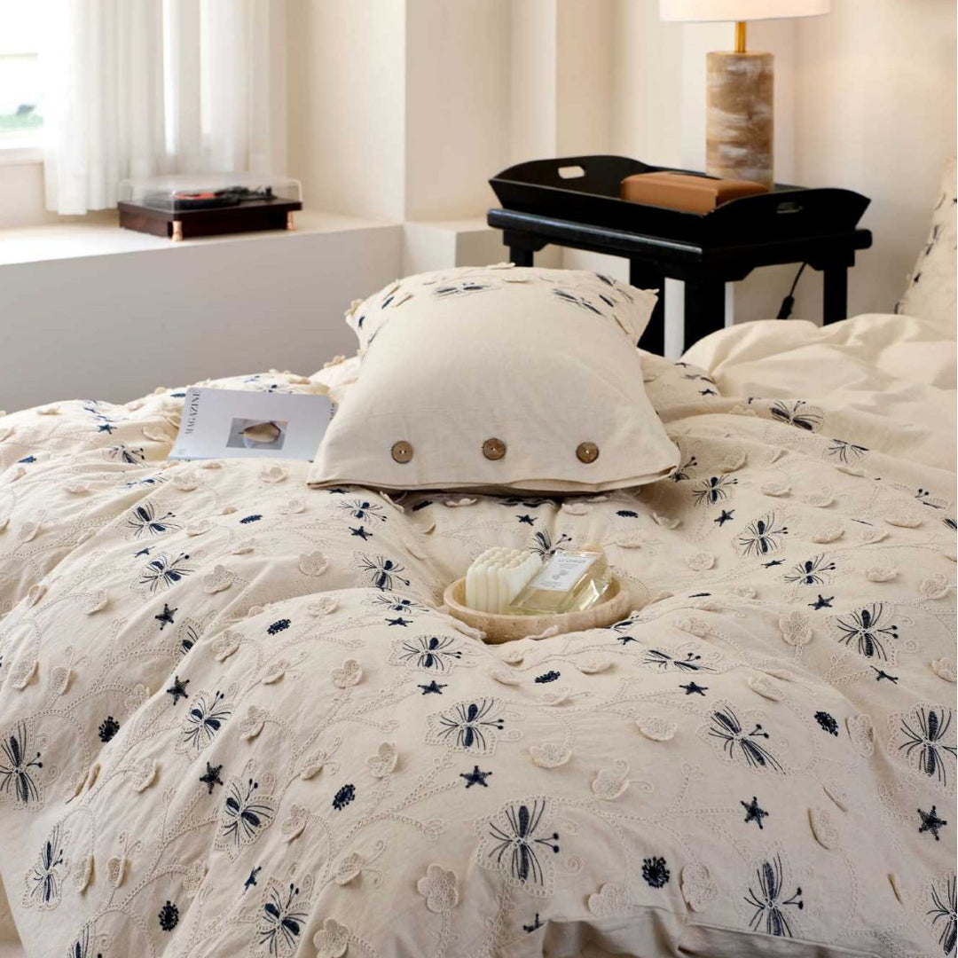 Embroidered cotton bedding set with wooden buttons and butterfly appliqués