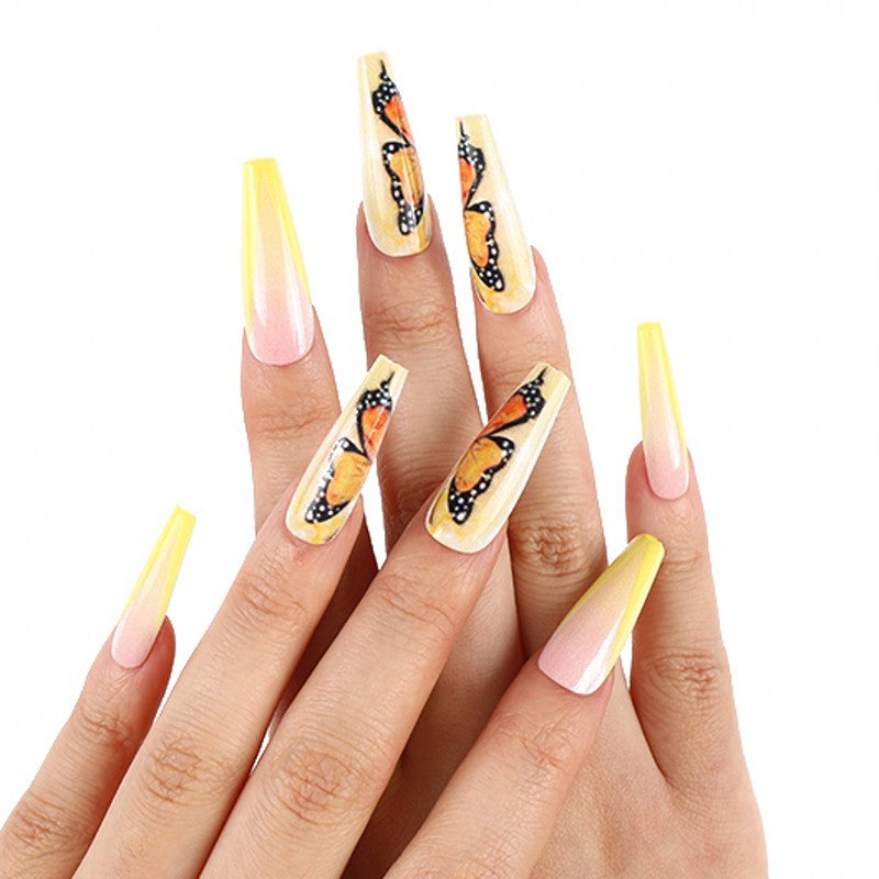 Art nails with butterfly motif Kalsten