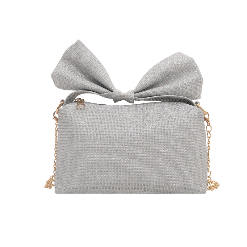 Bow-Accented Sparkling Handbag