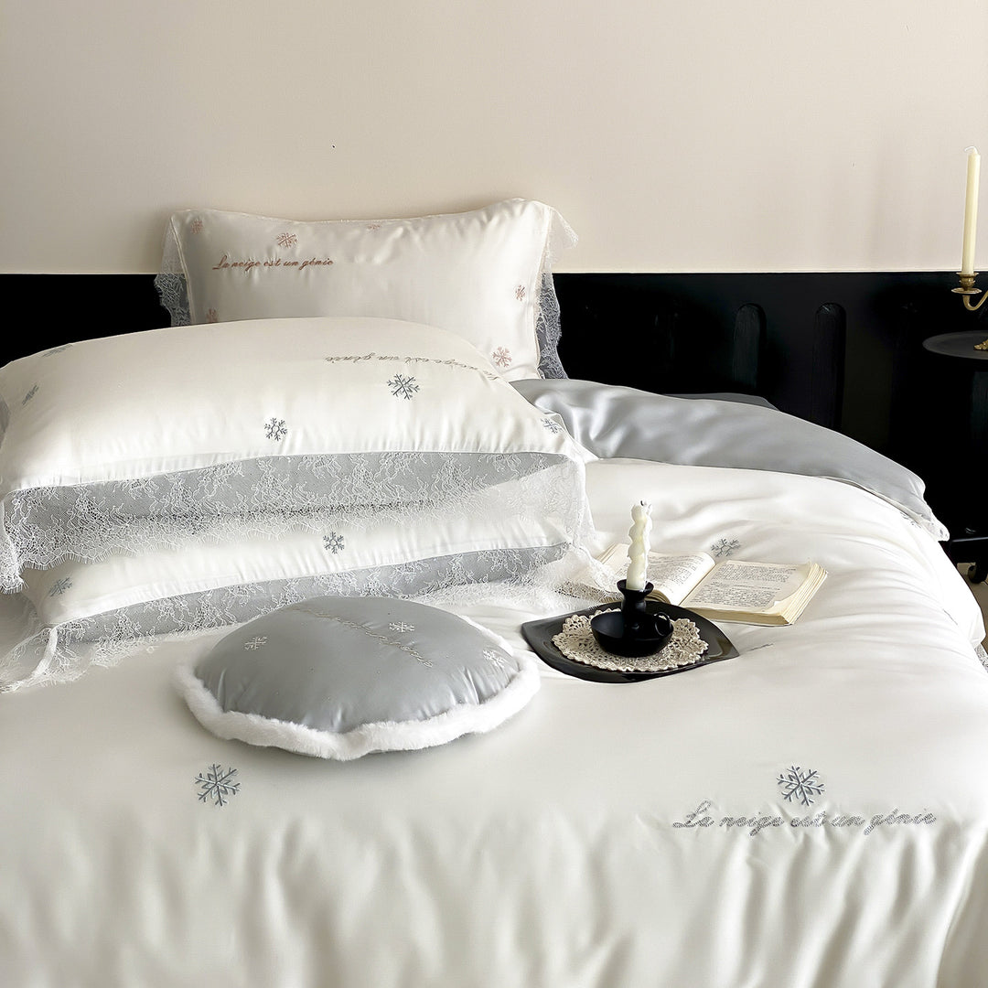 Luxurious satin bedding set with lace trim and snowflake embroidery