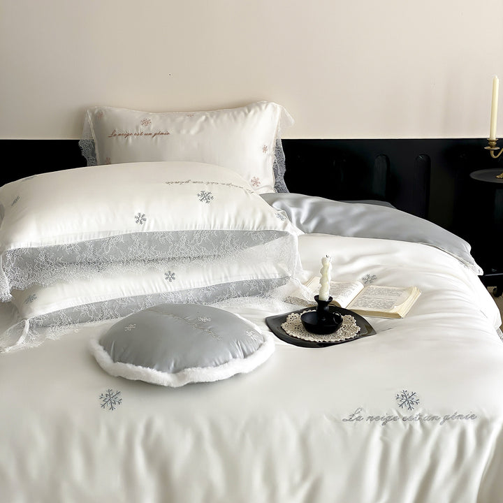 Luxurious satin bedding set with lace trim and snowflake embroidery