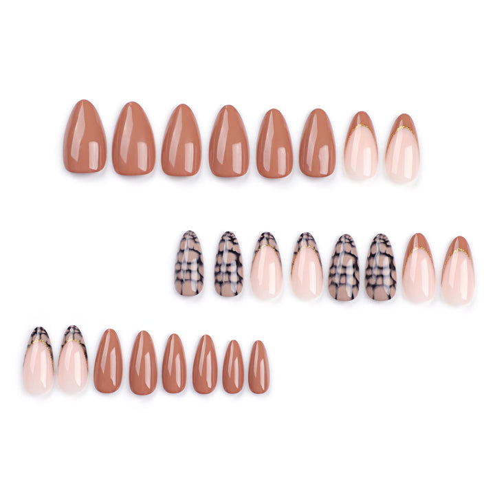 Artful stiletto nails with elegant gold decoration Kalsten