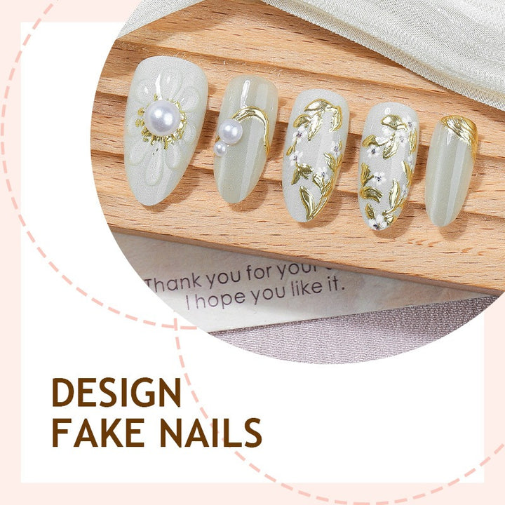 Acrylic nail set with elegant floral designs and glamorous glitter accents Kalsten