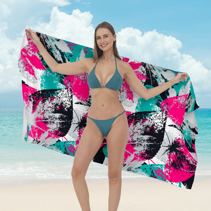 Beach towel with vibrant tropical plant motif Kalsten