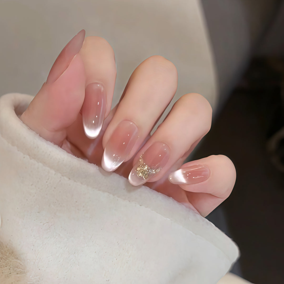 Artificial nails with elegant tip design and gold accents Kalsten