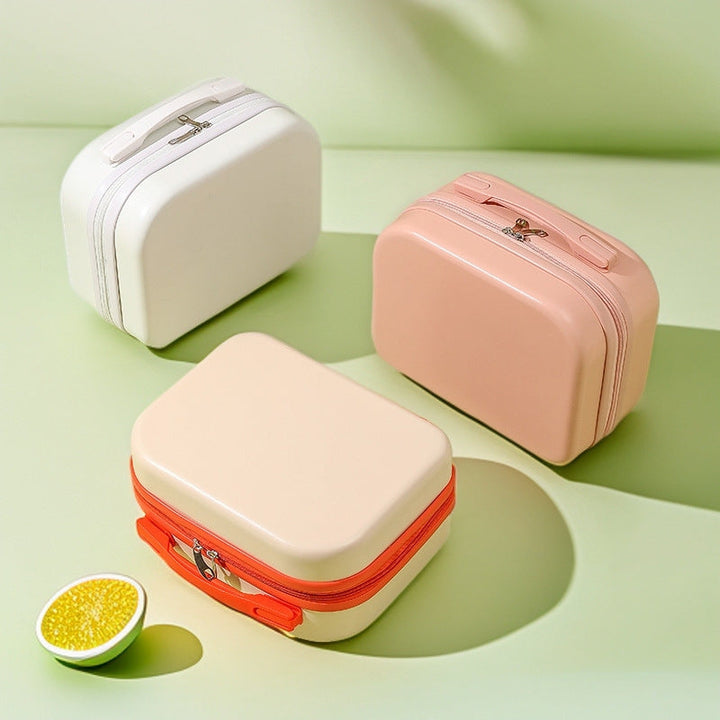 hard-shell travel vanity case with molded handle and double-zip closure Kalsten