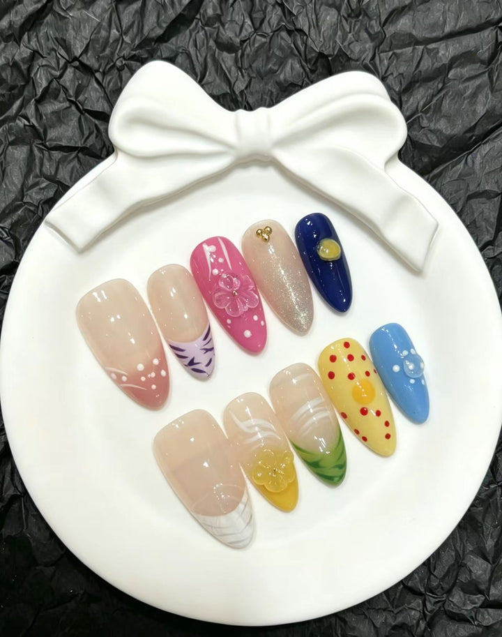 Artistic Press-On Nail Art Set with Floral and Colorful Designs
