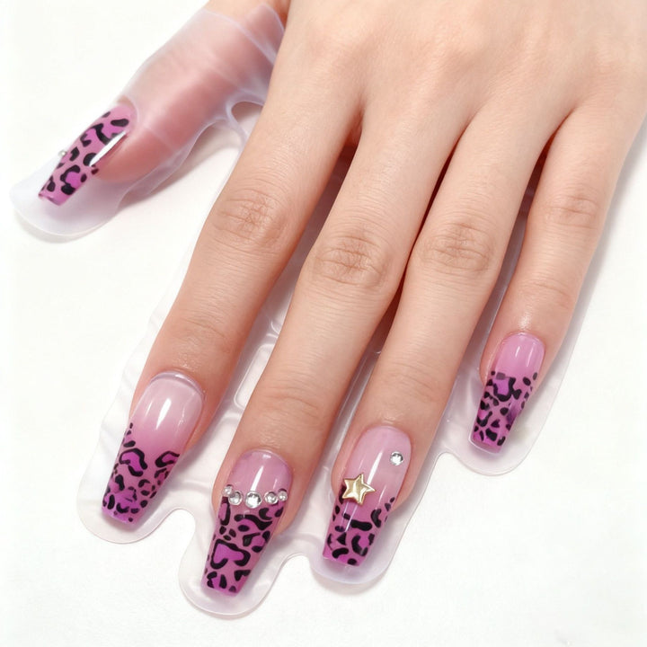 Artificial nails with leopard pattern and rhinestone details Kalsten
