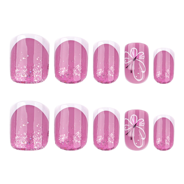 Artistic nail art with glitter and butterfly design Kalsten