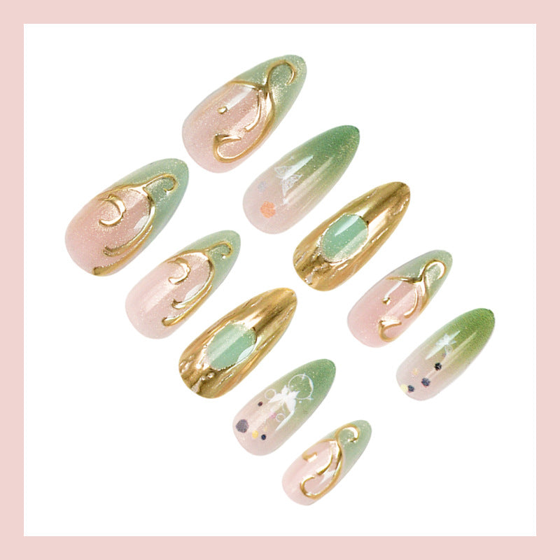 Nail art set with elegant gold accents and floral designs Kalsten