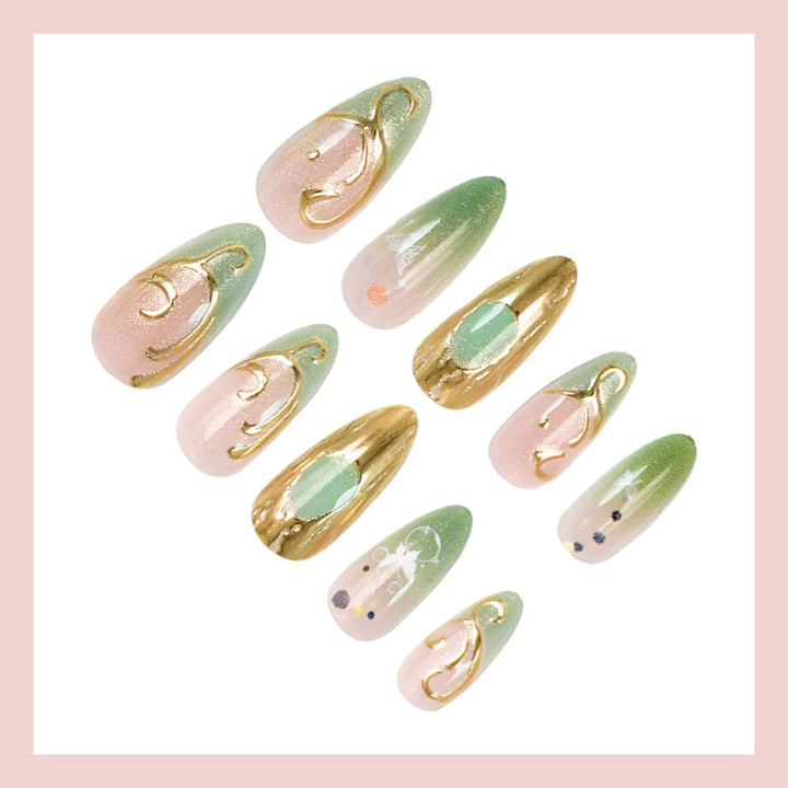 Nail art set with elegant gold accents and floral designs Kalsten