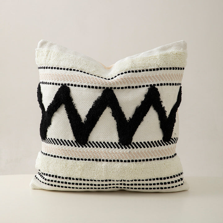 Handwoven decorative cushion cover made of cotton blend with tassels and structured stripe look