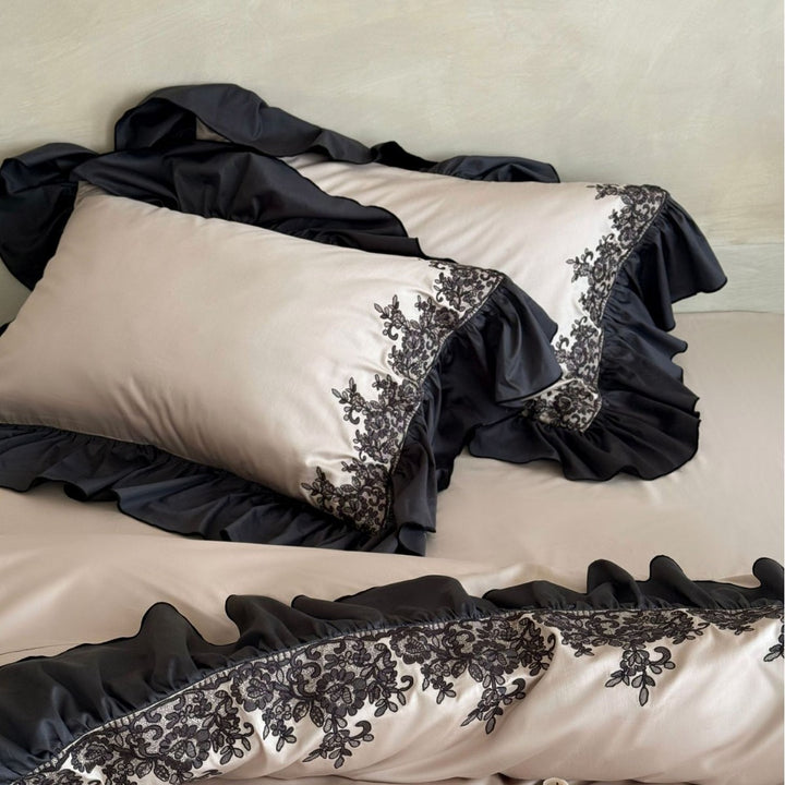 Satin bedding set with contrasting ruffle and ornament embroidery