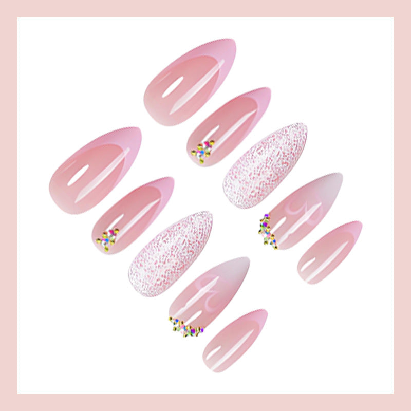 Artificial nail set with delicate glitter and heart designs Kalsten