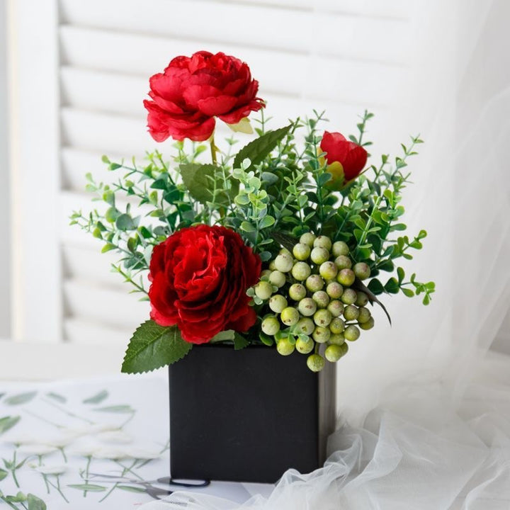 Lifelike Floral Arrangement in Decorative Square Planter