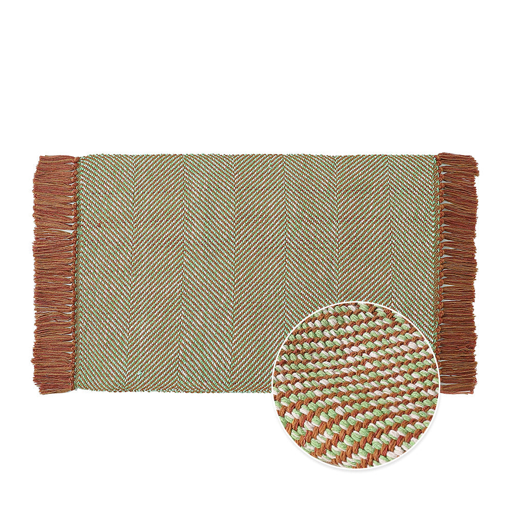 Woven table runner made of cotton blend with fine structure and herringbone look as well as decorative fringes Kalsten