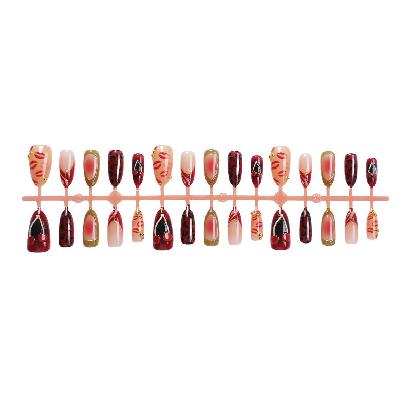Acrylic nail set with glamorous animal print and elegant accents Kalsten