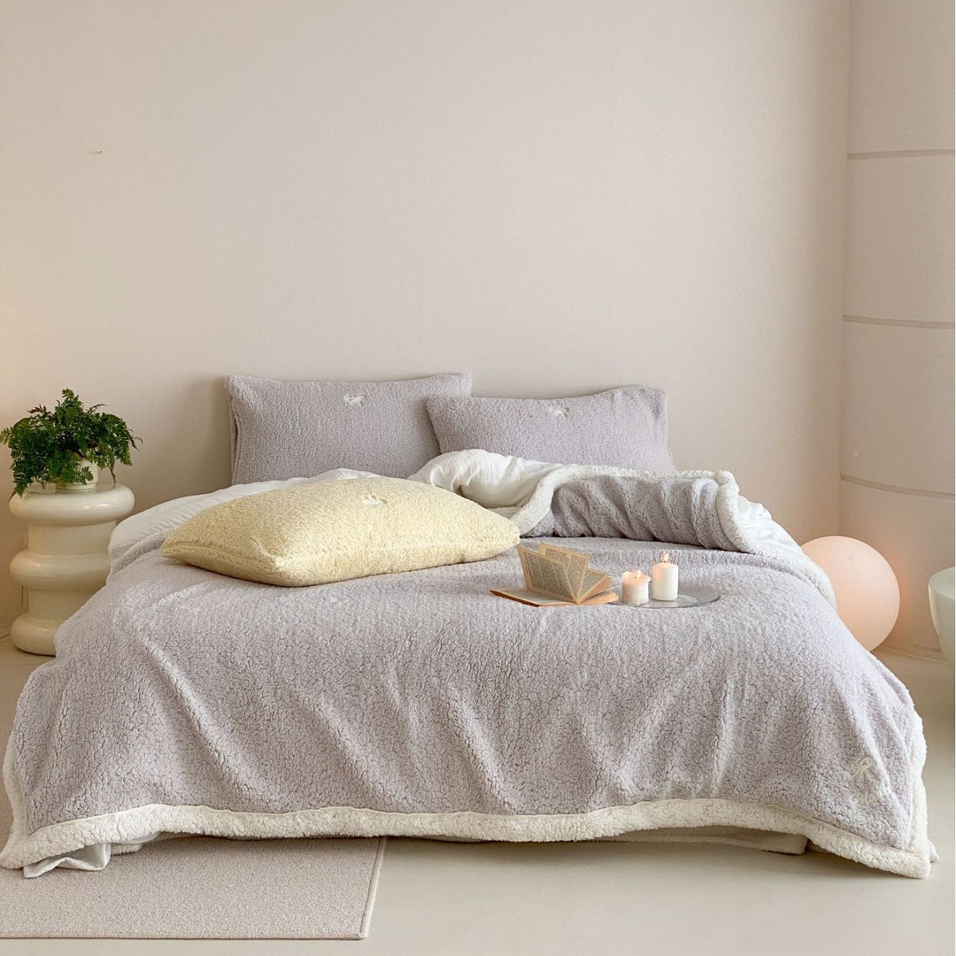 Cozy Sherpa blanket with reversible fleece lining